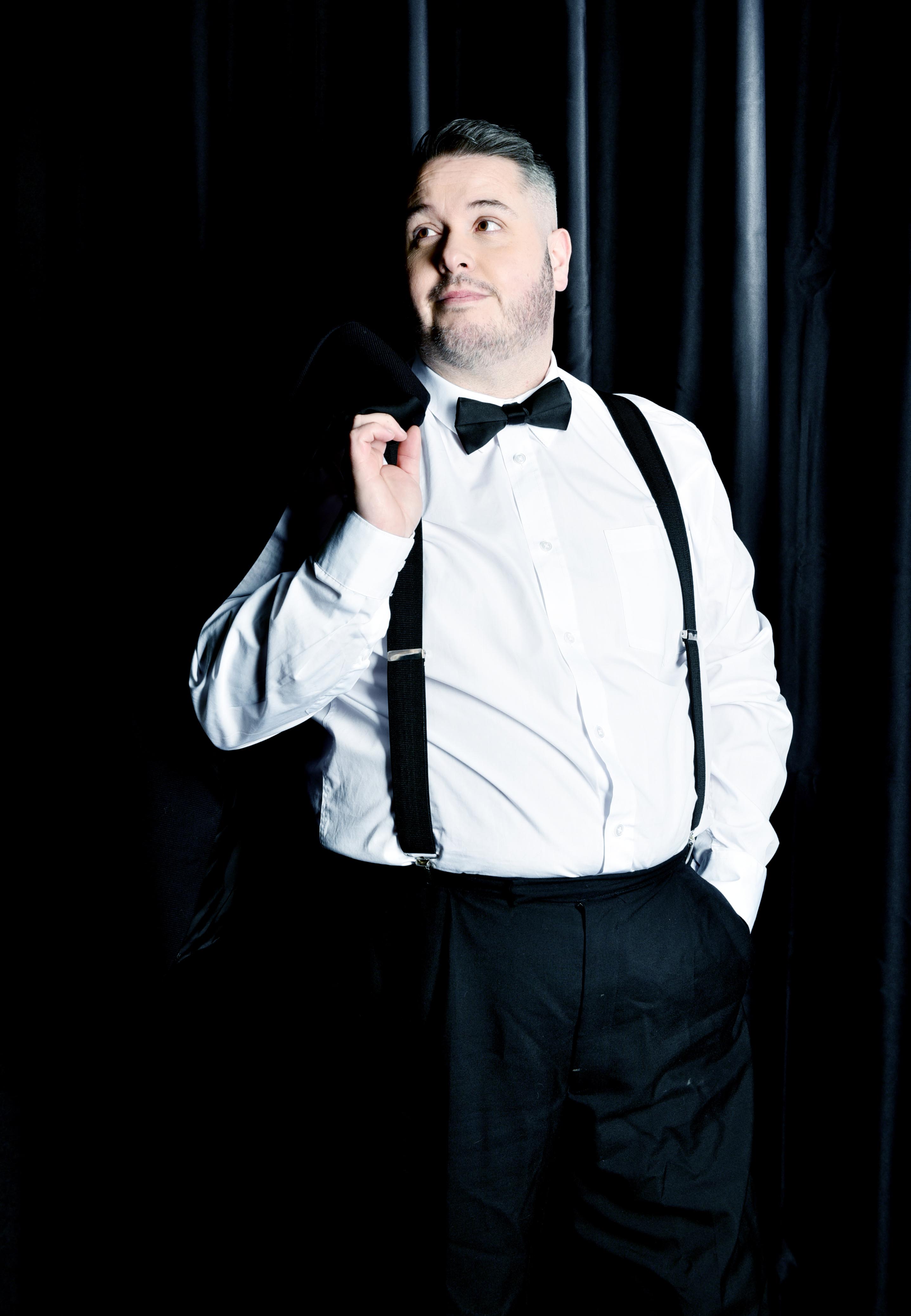 Jonathan Millard in professional attire ready for a major event